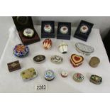 A collection of 18 enamel and other pill boxes.