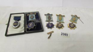 A Masonic silver locket and 4 RAOB silver medals (Roll of Honour).