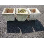 Three square garden pots.