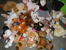 A large lot of assorted soft toys.