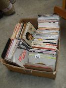A mixed lot of 45 rpm records.