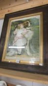 A framed and glazed 19th century print of a girl with a St. Bernard dog.