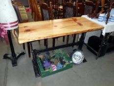 A lovely cast iron pub table with thick rustic pine top Height 77cm,