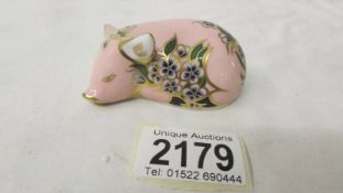 A Royal Crown Derby Plumstead pig, gold stopper.