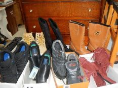 A mixed lot of boots and shoes including some new.