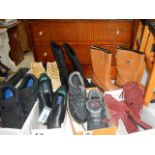 A mixed lot of boots and shoes including some new.