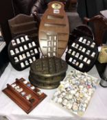 A large collection of thimbles & thimble display stands etc.
