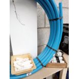 A good length of 25mm polypipe with fittings.
