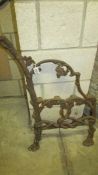 A single cast iron bench end.