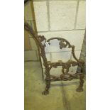 A single cast iron bench end.