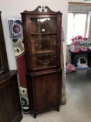 A darkwood astral glazed corner cupboard, Height 185cm,