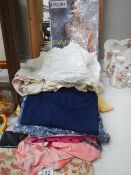 A mixed lot of ladies blouses and gent's shirts including some silk.