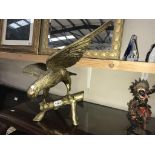 A large solid brass eagle with a 66cm wing span