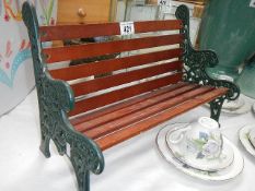 A cast iron dolls bench.