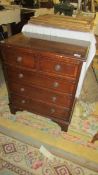 A 2 over 3 mahogany chest of drawers.