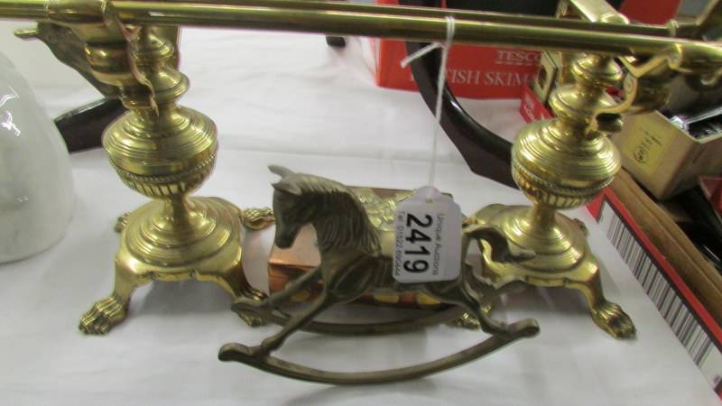 A pair of Victorian brass fire dogs, a brass poker, a brass toasting fork, - Image 2 of 2