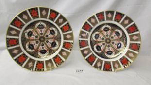 Two Royal Crown Derby 'Old Imari' pattern dinner plates.