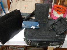 A mixed lot of attache cases and other bags.