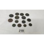 6 cartwheel pennies, a 1775 farthing, 2 1799 farthings and five other coins.