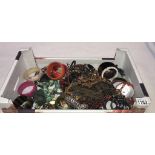 A large box of costume jewellery including bangles