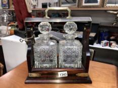 A lovely 2 bottle tantalus with key ****Condition report**** No visible makers marks,