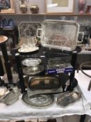 A quantity of silver plate Queen Anne trays, bottle holder,