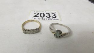 A 9ct gold and diamond ring, size L and a silver ring, size N.