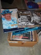 A box of Royalty magazines etc.