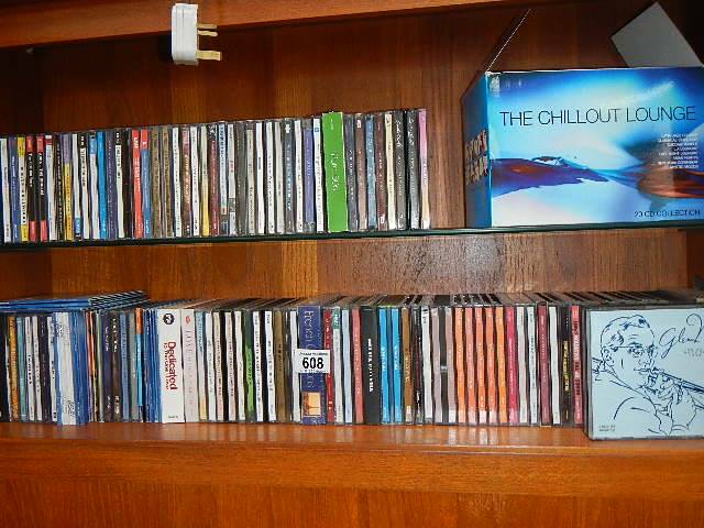 2 shelves of assorted CD's.