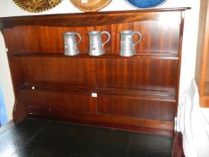 A mahogany dresser top.