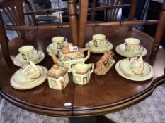 A cottage ware tea set, 23 pieces,
