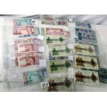 A collection of old bank notes including Gibraltar, British Linen Bank, Armed Forces Bank etc.