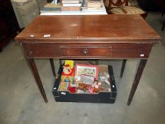 A Victorian mahogany fold over card table with tapered legs and drawer Height 75cm, width 91cm,