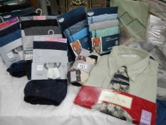 A mixed lot of new shirts, under pants etc.