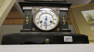 A Victorian Palladian style 8 day mantel clock.