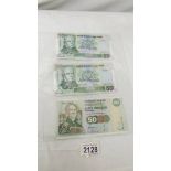 Three Bank of Scotland fifty pound notes.