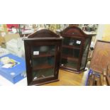 A small display cabinet and a small corner display cabinet.