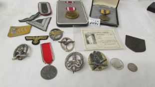 A mixed lot of German medals, badges etc.