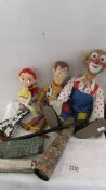 A vintage clown doll, 2 Toy Story talking dolls, a Hohner harmonica,