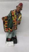 A Royal Doulton figurine "Carpet seller", HN1464. (In good condition with no cracks or chips).