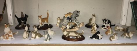 A good collection of over 20 Sherratt & Simpson cat figures including rocking horse