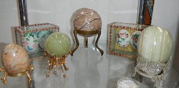 A collection of stone and other eggs.