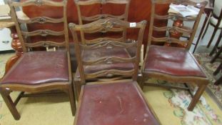 A set of 4 oak dining chairs, in need of a tidy up.