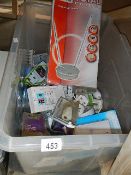 A box of electric extension leads, plugs etc.