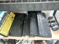 6 computer keyboards with mice