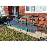 A disabled access wheelchair ramp.