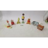 A Beswick Christopher Robin, Piglet, Hee Haw, Winnie the Pooh, Tigger, Piano and Dusk on Ski's.