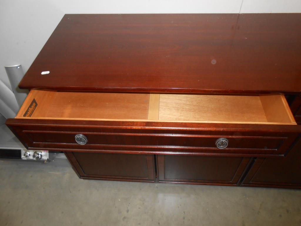 A dark wood stained sideboard with 2 drawers and 4 doors, 1 drawer being a cutlery drawer, - Image 2 of 5