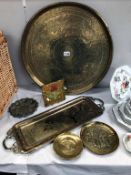 A large brass tray (61cm diameter) plus other brass trays,