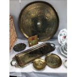 A large brass tray (61cm diameter) plus other brass trays,